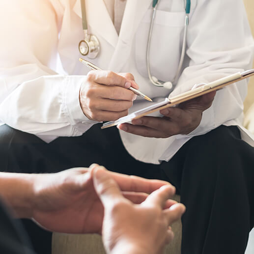 doctor talking with patient