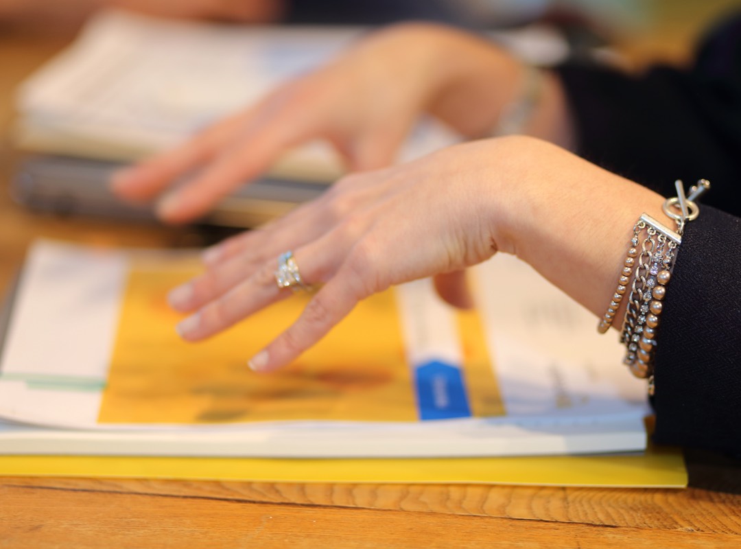 close-up of documents on table in a meeting