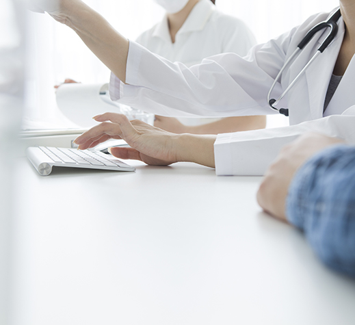 physician working at computer