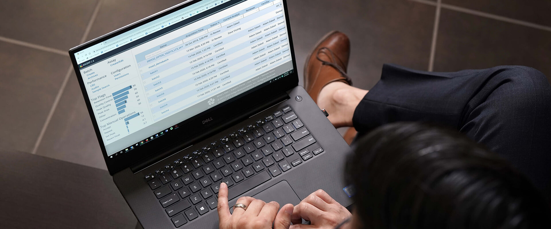 Man viewing data using Indigo BioAutomation on his laptop