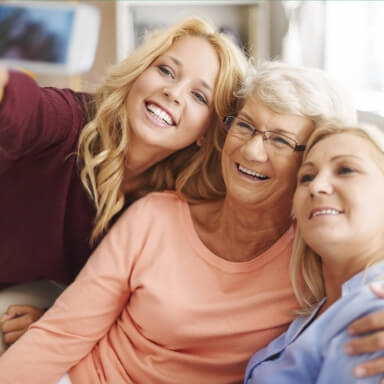 Group of women smiling - generational womens health service line