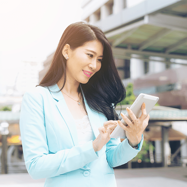 woman browsing internet on tablet