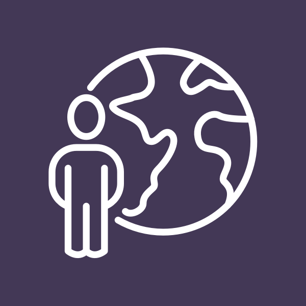 person standing next to globe