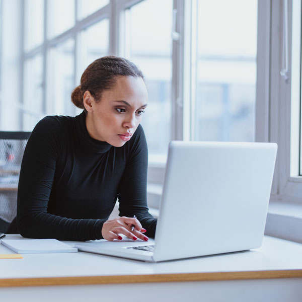Professional woman working on laptop