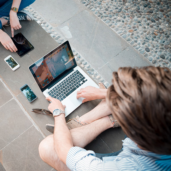 man taking survey on laptop
