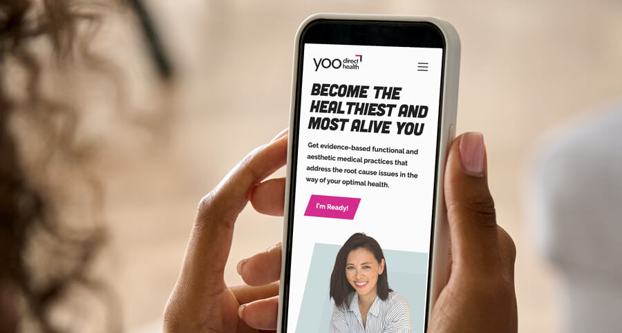 Preview of homepage of TBH Creative's award-winning website design for Yoo Direct Health on mobile device