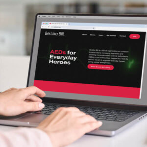 Woman views Be Like Bill's nonprofit healthcare marketing website on her laptop