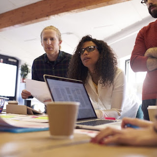 Coworkers in a website project meeting