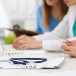 people in a meeting to talk about group practice marketing