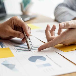 agency team reviewing healthcare marketing statistics