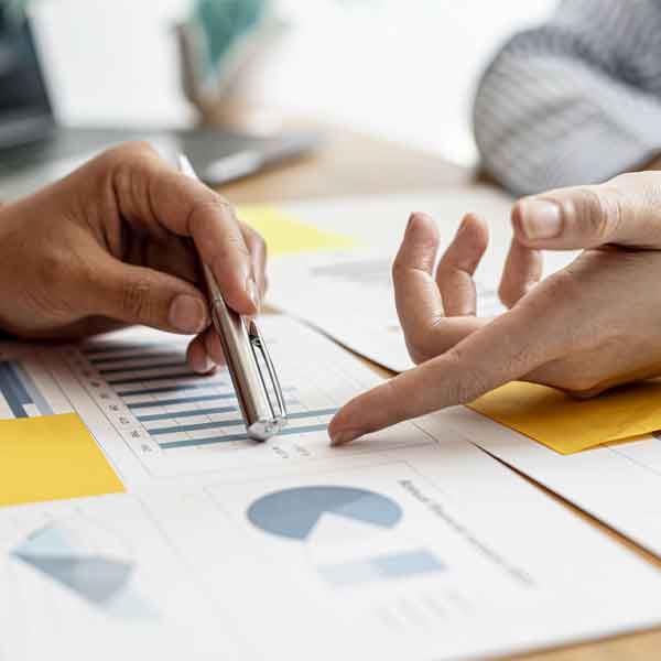 agency team reviewing healthcare marketing statistics