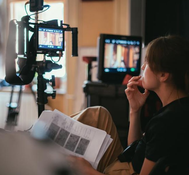 Video marketing professionals behind the camera at a video shoot