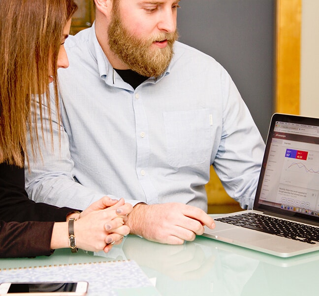 Tatum and Kevin review results in Google analytics together