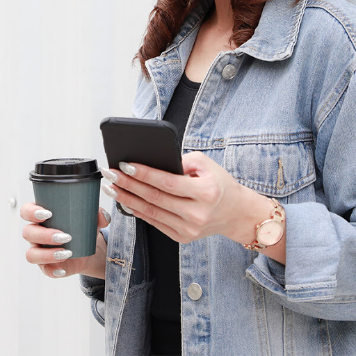 woman looking at phone