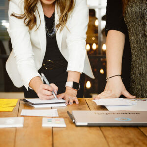 TBH Creative team taking notes in a marketing planning meeting